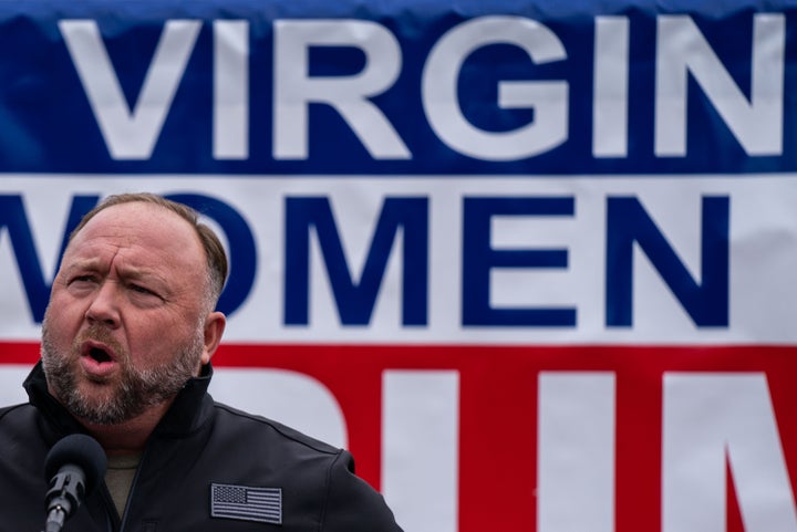 Alex Jones speaks during a Stop the Steal rally in front of the Supreme Court in Washington on Jan. 5, 2021.