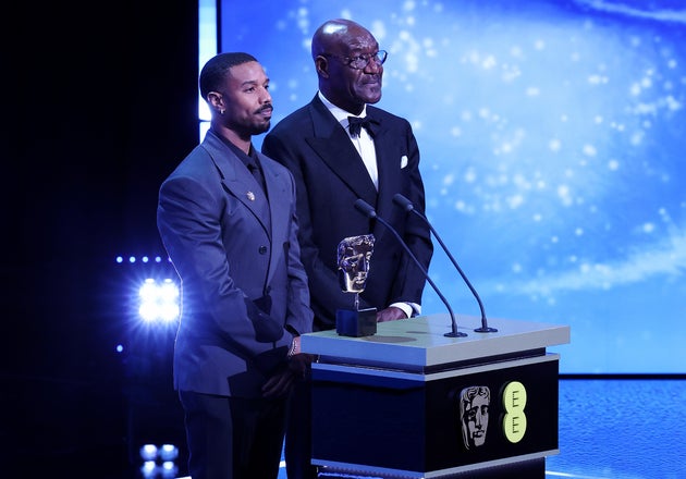 Michael B. Jordan and Delroy Lindo on stage during the 2026 Baftas
