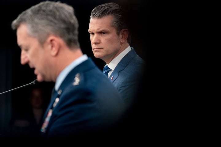 Pete Hegseth, US secretary of defense, right, and John D. Caine, chairman of the Joint Chiefs of Staff, during a news conference at the Pentagon in Arlington, Virginia, US, on Wednesday, April 8, 2026.
