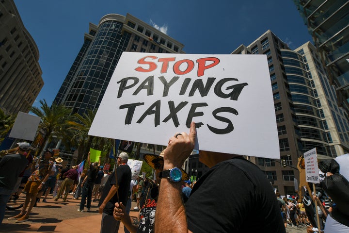 Not paying taxes is a growing idea for people opposing the Trump administration. But there can be serious consequences if you follow through.