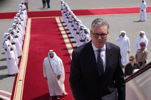 Keir Starmer boards a plane in Doha, Qatar, after his three day visit to the Gulf.