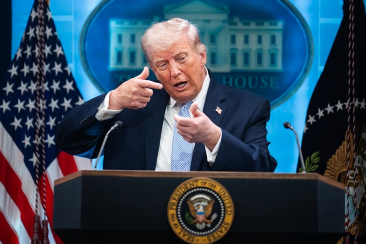 Trump mimics firing a gun during a news conference in the White House briefing room about the war in Iran on April 6, 2026. Several high-profile figures who were previously close allies have criticized his actions around Iran.