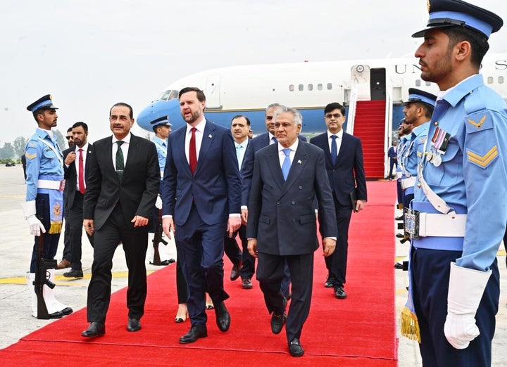 Vice President JD Vance (C) is welcomed by Ishak Dar (R), Pakistan Foreign Minister, and Asim Munir (L), Chief of Army Staff of Pakistan, as the US delegation arrive in Islamabad, capital of Pakistan, for high-stakes talks with Iran to end the Middle East conflict amid the ongoing two-week ceasefire on April 11, 2026. (Photo by Min. of Foreign Affairs of Pakistan / Handout /Anadolu via Getty Images)