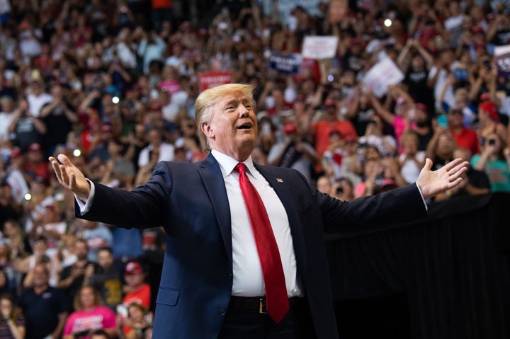 Trump enjoying the applause at a "Make America Great Again" campaign rally in 2019 in Cincinnati.