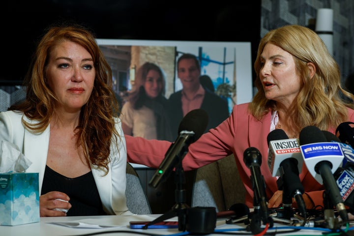 Lisa Bloom (right) comforts Lonna Drewes during a press conference in which Drewes accused U.S. Rep. Eric Swalwell (D-Calif.), who resigned from Congress Tuesday, of sexually assaulting her in 2018.