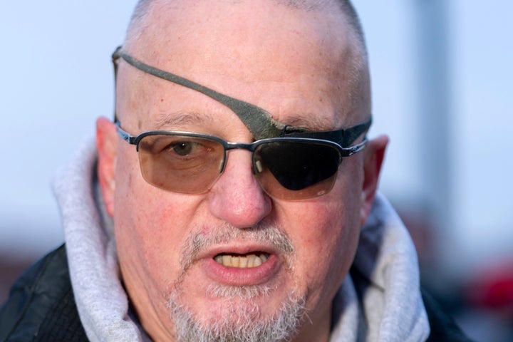 President Donald Trump supporter Oath Keepers founder Stewart Rhodes convicted on charges relating to the Jan. 6 riot at the U.S. Capitol, talks to reporters outside the DC Central Detention Facility, after being released from a jail in Maryland, in Washington, Tuesday, Jan. 21, 2025. (AP Photo/Jose Luis Magana)