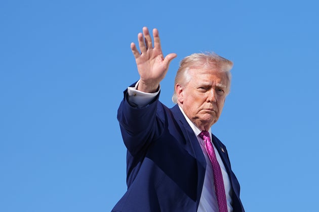 President Donald Trump boards Air Force One at Joint Base Andrews, Md., Friday, April 10, 2026, en route to Charlottesville, Va.