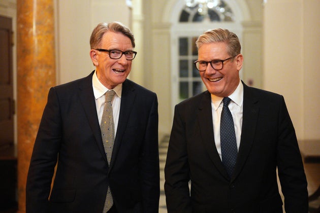 British Prime Minister Keir Starmer, right, talks with Britain's ambassador to the United States Peter Mandelson during a welcome reception at the ambassador's residence on Wednesday, Feb. 26, 2025 in Washington. 