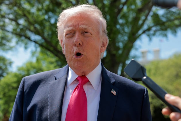 US President Donald Trump speaks to the media before boarding Marine One on the South Lawn of the White House on April 16, 2026 in Washington, DC.