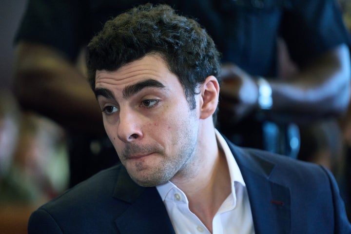 Luigi Mangione appears in Manhattan Criminal Court on Dec. 18, 2025. A man arrested on suspicion of attacking OpenAI CEO Sam Altman's home reportedly referred to Mangione in an anti-AI Discord chat last year.