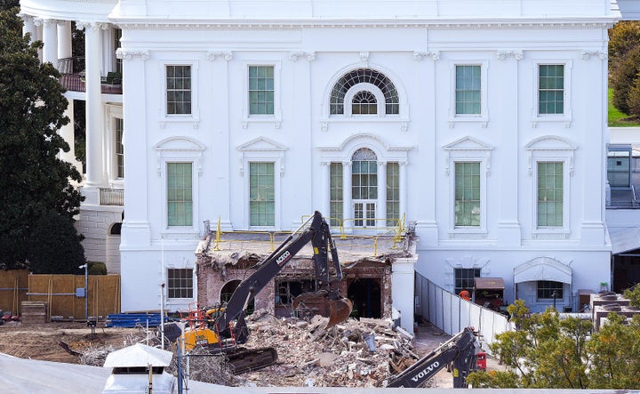 An excavator works to clear rubble after the East Wing of the White House was demolished on Oct. 23, 2025, in Washington, D.C. The demolition is part of U.S. President Donald Trump's plan to build a multimillion-dollar ballroom on the eastern side of the White House.