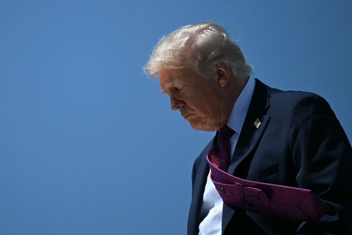 President Donald Trump steps off of Air Force One upon arrival at Phoenix Sky Harbor International Airport in Phoenix, Arizona, on April 17, 2026. (Photo by Jim WATSON / AFP via Getty Images)