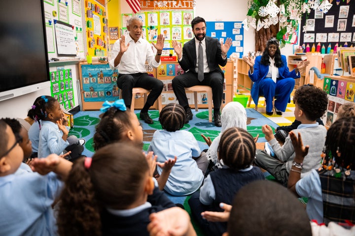 Former President Barack Obama and Mayor Zohran Mamdani sing "Wheels on the Bus" to children at Learning Through Play Pre-K in the Bronx in New York, Saturday, April 18, 2026. (AP Photo/Angelina Katsanis)