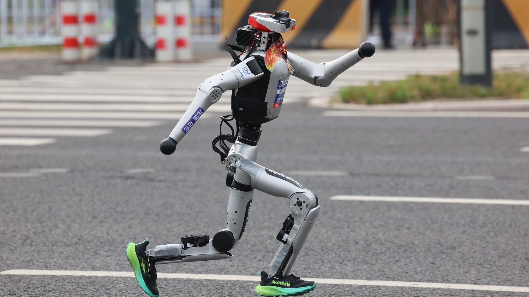 Chinese Humanoid Robots Shatter Records in Beijing Half-Marathon, Showcasing Rapid AI Advances