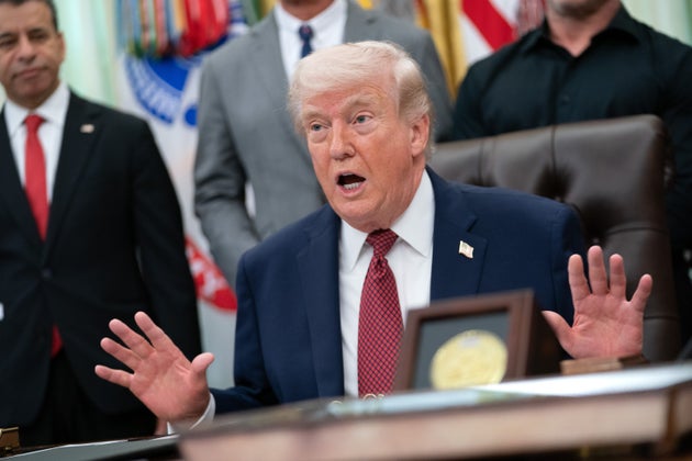 President Donald Trump, seen here in the Oval Office on Saturday, seemed to be spinning out over dismal poll numbers and backlash to the conflict in Iran in a Monday morning post on Truth Social.