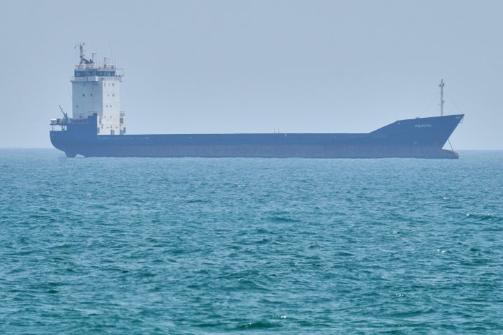 A tanker sits anchored in the Strait of Hormuz off the coast of Qeshm Island, Iran, Saturday, April 18, 2026. (AP Photo/Asghar Besharati)