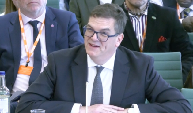 Olly Robbins gives evidence to the committee.