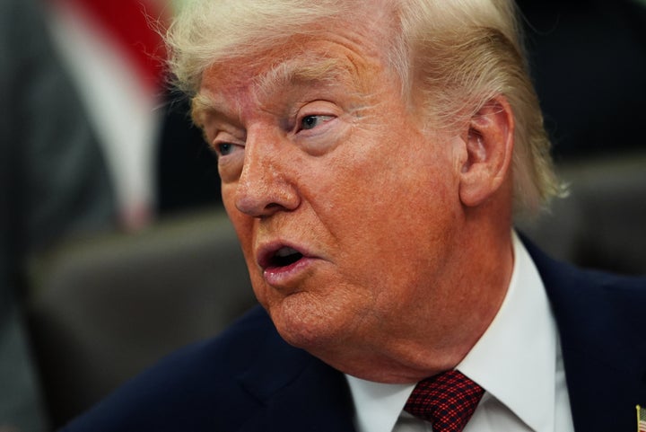 President Donald Trump speaks in the Oval Office of the White House, on April 18, 2026, in Washington.