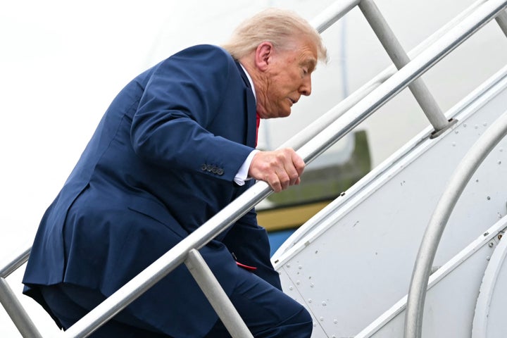 Trump appears to misstep while boarding Air Force One prior to departure from New Jersey’s Morristown Municipal Airport on June 8, 2025, en route to Camp David.