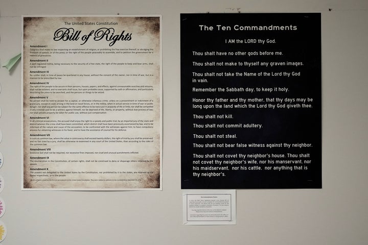 The Bill of Rights and Ten Commandments are displayed in a classroom in Kyle, Texas. Opponents have argued that hanging the Ten Commandments in classrooms proselytizes to students and amounts to religious indoctrination by the government.