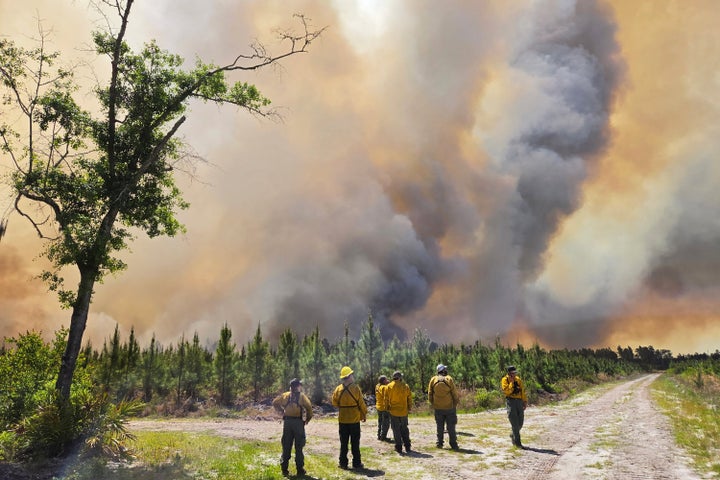 Firefighters respond to the Pineland Road Fire in southeast Georgia on April 22, 2026.