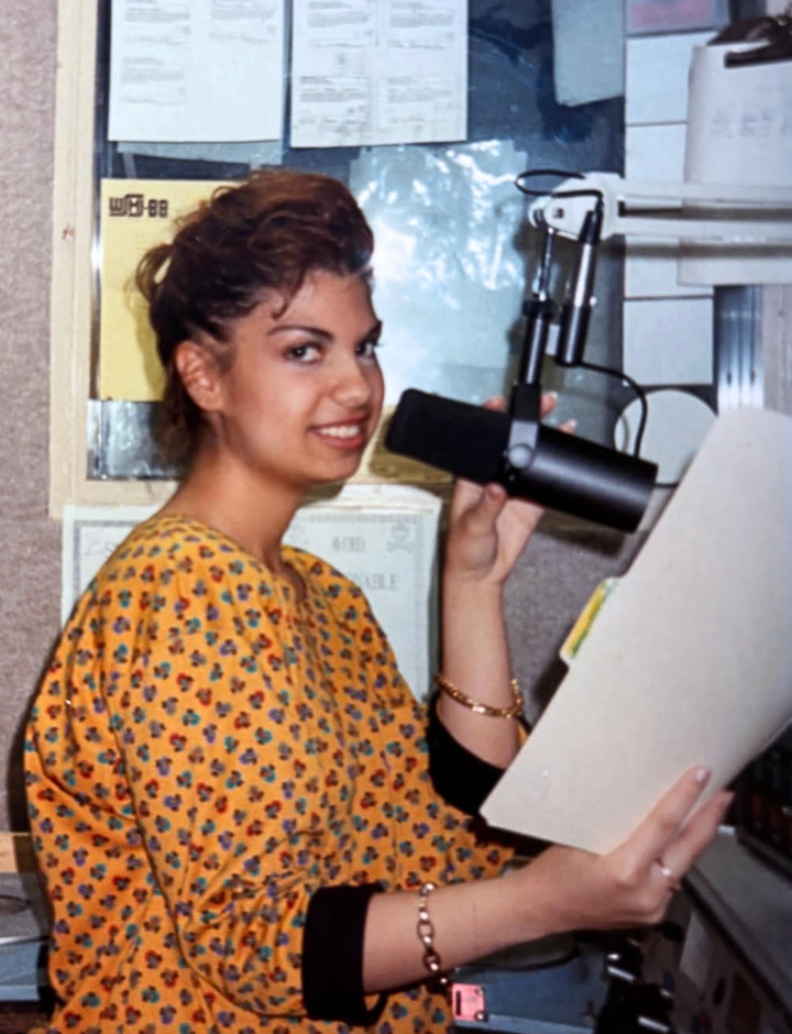 Less than a year after arriving in the U.S., the author assimilated into American mainstream culture. This photo was taken at WRCJ, the author’s high school radio station, where she DJ’d the afternoon program even though she could barely speak English.