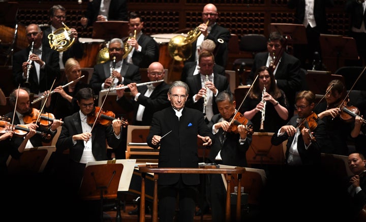 Then-San Francisco Symphony Music Director Michael Tilson Thomas leads the crowd as they sing the national anthem during the San Francisco Symphony season-opening gala in San Francisco, Calif., on Wednesday, Aug. 5, 2018.