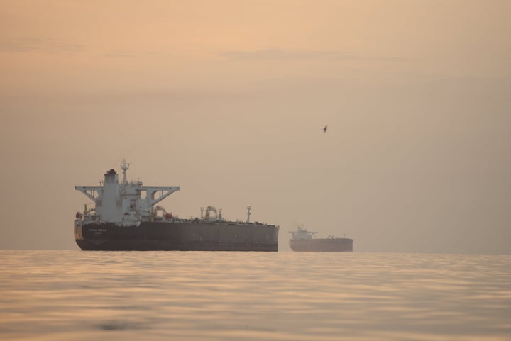 Tankers anchored in the Strait of Hormuz off the coast of Qeshm Island, Iran, Saturday, April 18, 2026. (AP Photo/Asghar Besharati)