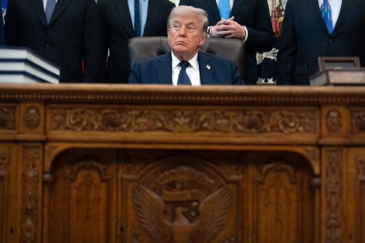 President Donald Trump listens during an event on health care affordability in the Oval Office at the White House, Thursday, April 23, 2026, in Washington. (AP Photo/Mark Schiefelbein)