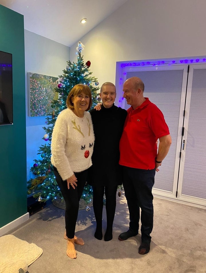 Lizzie with her parents