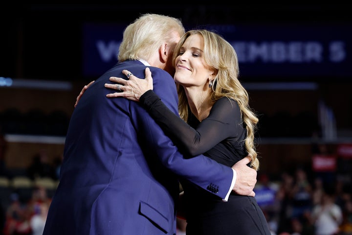 President Donald Trump seen embracing Megyn Kelly at his campaign rally at on November 04, 2024 in Pittsburgh, Pennsylvania. 