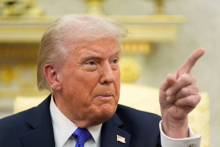 President Donald Trump takes questions from reporters in October.