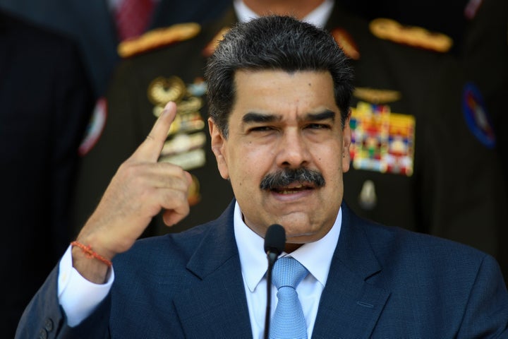 Venezuelan President Nicolas Maduro gives a press conference at the Miraflores presidential palace, March 12, 2020, in Caracas, Venezuela. (AP Photo/Matias Delacroix, File)