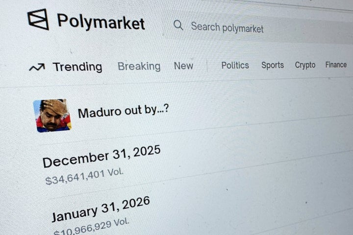 FILE - The Polymarket prediction market website is displayed on a computer screen, Jan. 11, 2026, in New York. (AP Photo/Wyatte Grantham-Philips, File)