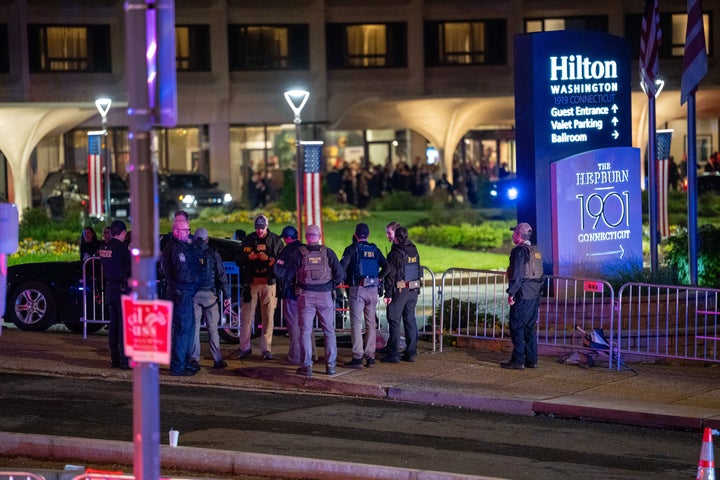 WASHINGTON, DC - APRIL 25: FBI and Homeland Security officers surround the Washington Hilton Hotel where shots were fired near the White House Correspondents' Dinner featuring President Donald Trump in Washington, D.C. on April 25, 2026. (Photo by Andrew Leyden/Getty Images)