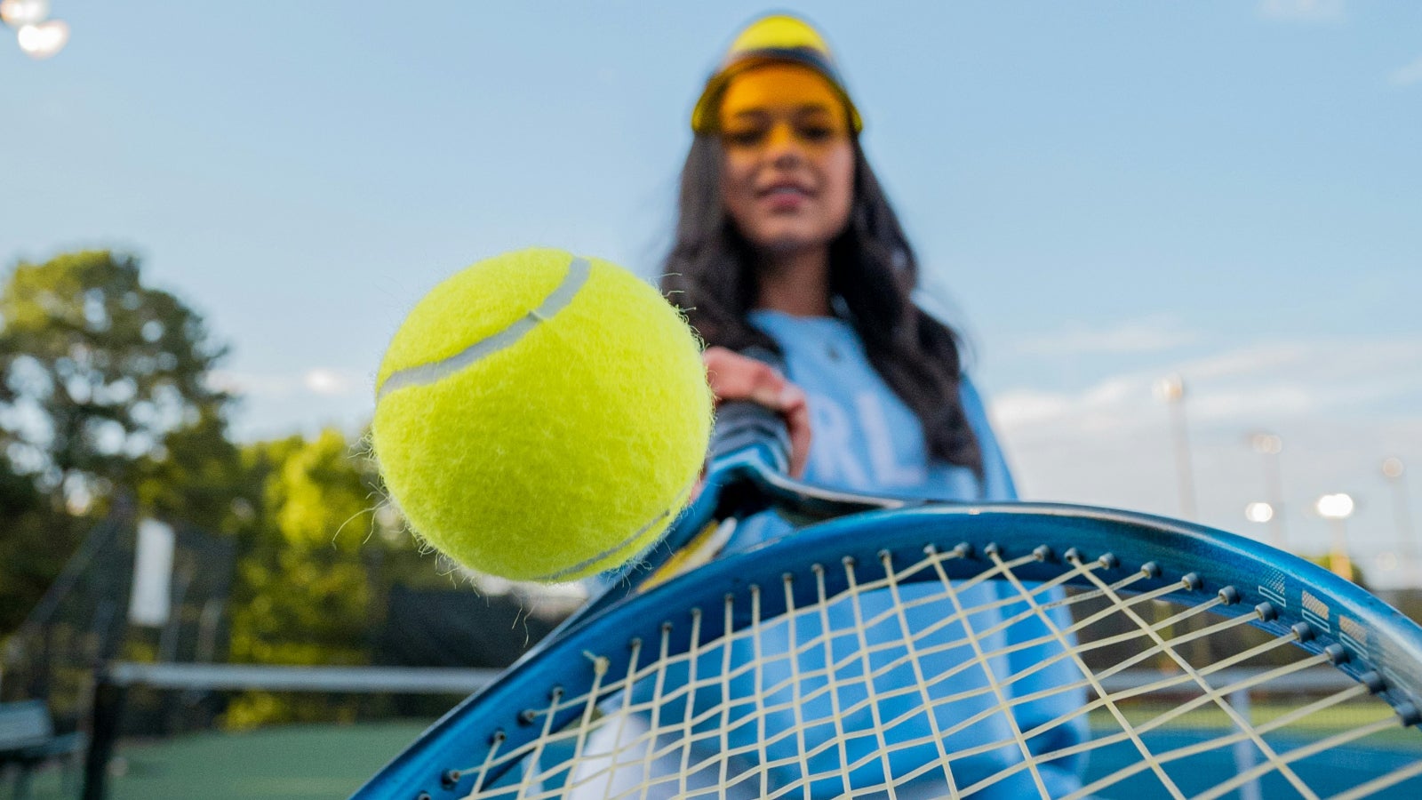 Why You Should Always Pack A Tennis Ball In Your Hand Luggage