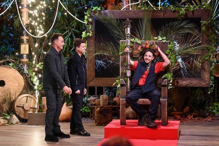Adam Thomas celebrating his win with I'm A Celebrity hosts Ant and Dec