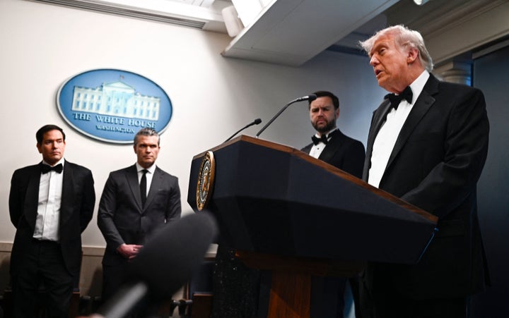President Donald Trump speaks, flanked by Vice President JD Vance, Secretary of Defense Pete Hegseth and Secretary of State Marco Rubio, during a press briefing in the Brady Briefing Room at the White House in Washington, D.C., shortly after a shooting incident at the White House Correspondents' Dinner.
