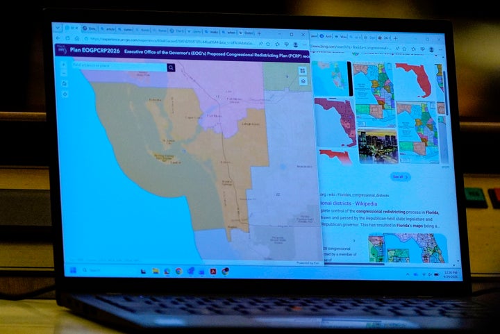 A state Senators laptop displays a proposed Congressional Redistricting Plan during debate on SB 8-D, a redistricting bill, during a special session of the Florida Legislature, Wednesday, April 29, 2026, in Tallahassee, Fla. (AP Photo/Mike Stewart)