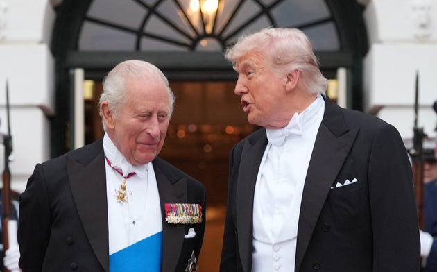 President Donald Trump greets Britain's King Charles III at the South Portico of the White House for a State Dinner Tuesday, April 28, 2026, in Washington.