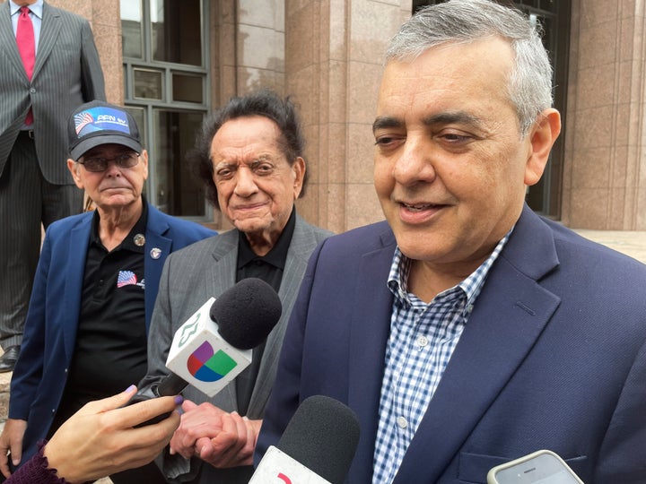 FILE - Former U.S. Rep. David Rivera speaks with media outside a federal court in Miami, Dec. 20, 2022. (AP Photo/Joshua Goodman, File)