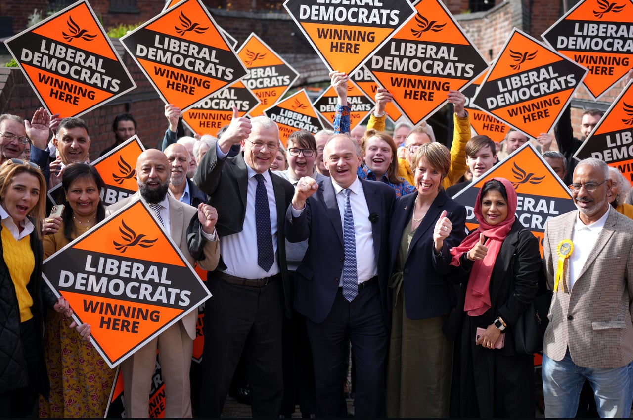 Liberal Democrat party leader Sir Ed Davey (C), along with Roger Harmer, leader of Birmingham Liberal Democrats (CL), launches their local election campaign at The Roundhouse on April 10, 2026