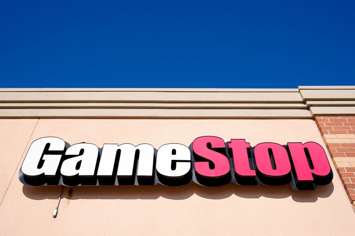FILE - A GameStop sign is displayed above a store in Urbandale, Iowa, on Jan. 28, 2021. (AP Photo/Charlie Neibergall, File)