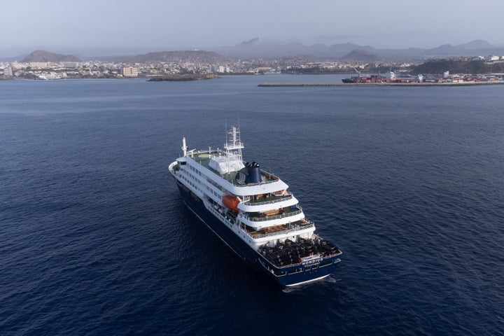 The cruise ship MV Hondius is seen anchored off the port of Praia, the capital of Cape Verde, on Tuesday. 