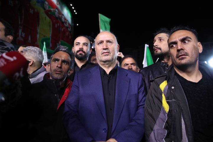 Iran Football Federation President Mehdi Taj, center, said FIFA must guarantee that the Islamic Revolutionary Guard Corps (IRGC) is not insulted by the United States if the national team is to travel to the country to play at the World Cup in June.