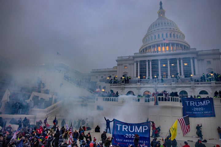 Tear gas is fired at supporters of President Trump who stormed the United States Capitol building.