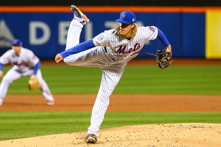 Noah Syndergaard pitches the Mets to victory in Game 3 of the 2015 World Series against Kansas City.