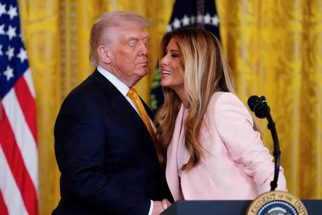 President Donald Trump is introduced by first lady Melania Trump during a Mother's Day event for members of the military, Wednesday, May 6, 2026, in the East Room of the White House, in Washington.