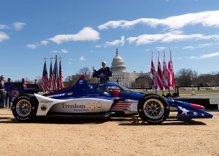 President of Penske Corporation Bud Denker speaks during the announcement of the street race circuit “Freedom 250 Grand Prix Washington, D.C.” next to an IndyCar show car on Monday, March 9, 2026, in Washington.