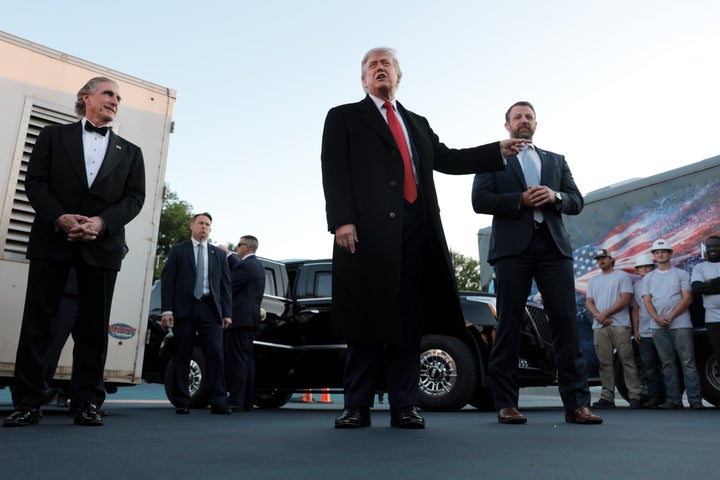 WASHINGTON, DC - MAY 07: U.S. President Donald Trump speaks as he inspects the painting of the Lincoln Memorial Reflecting Pool basin, with U.S. Secretary of the Interior Doug Burgum (L) and U.S. Secretary of Homeland Security Markwayne Mullin (R) looking on, on May 07, 2026 in Washington, DC.The repairs are part of President Trump's "Safe and Beautiful" campaign to clean up parks and monuments in the city. (Photo by Anna Moneymaker/Getty Images)